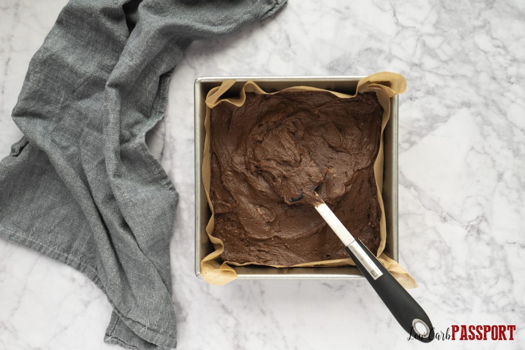 spread brownie mixture into pan